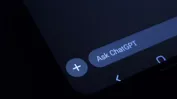 Close-up of a smartphone interface showing an input area labeled 'Ask ChatGPT' with a plus button.