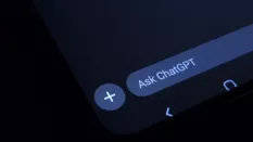 Close-up of a smartphone interface showing an input area labeled 'Ask ChatGPT' with a plus button.
