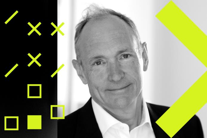 A smiling man in a suit against a creative background featuring geometric shapes.