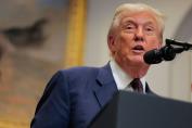 donald-trump-speaking-at-white-house-podium-blue-suit
